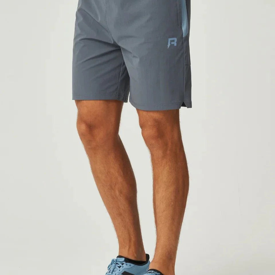 Reprimo Vortex Shorts in dusky blue with ergonomic panels and adjustable waistband for active movement and comfort