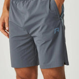 Men wearing dusky blue Reprimo Vortex Shorts with ergonomic panels and adjustable waistband