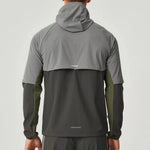 Back view of man wearing Reprimo Vortex Windbreaker in olive and dark grey with ergonomic fit and reflective details