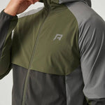 Reprimo Vortex Windbreaker in olive and dark grey with ergonomic design and reflective details