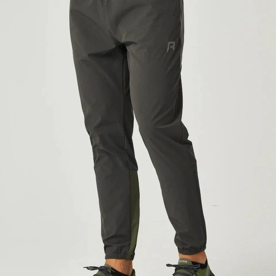 Reprimo Vortex Pants in olive and dark grey with ergonomic paneling and adjustable waistband for flexible performance