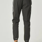 Back view of Reprimo Vortex Pants in olive and dark grey with ergonomic paneling and adjustable waistband.