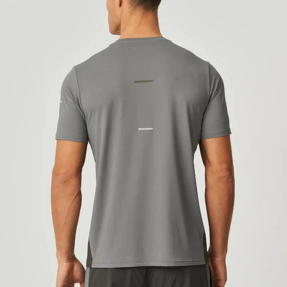 Back view of man wearing olive and dark grey Reprimo Vortex T-Shirt with ergonomic shaping and lightweight performance fabric