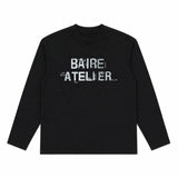 Baire Atelier striped black long sleeve tee with brushstroke design