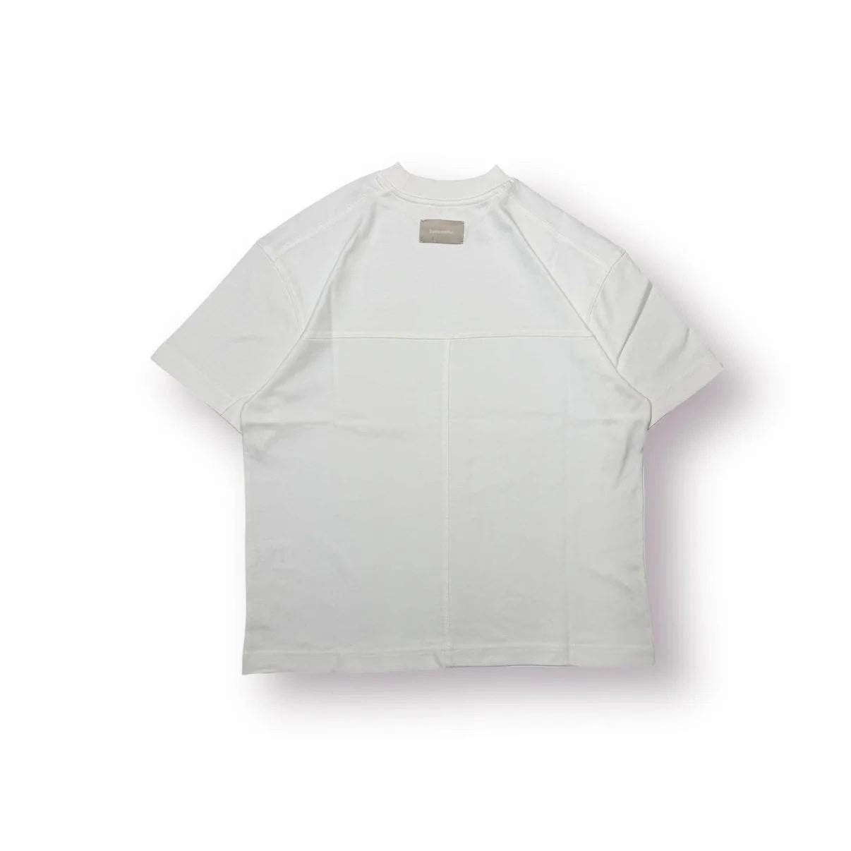 White Baire Atelier Blank Tee with high neckline, dropped shoulders, relaxed fit, and custom back paneling
