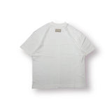 White Baire Atelier Blank Tee with high neckline, dropped shoulders, relaxed fit, and custom back paneling