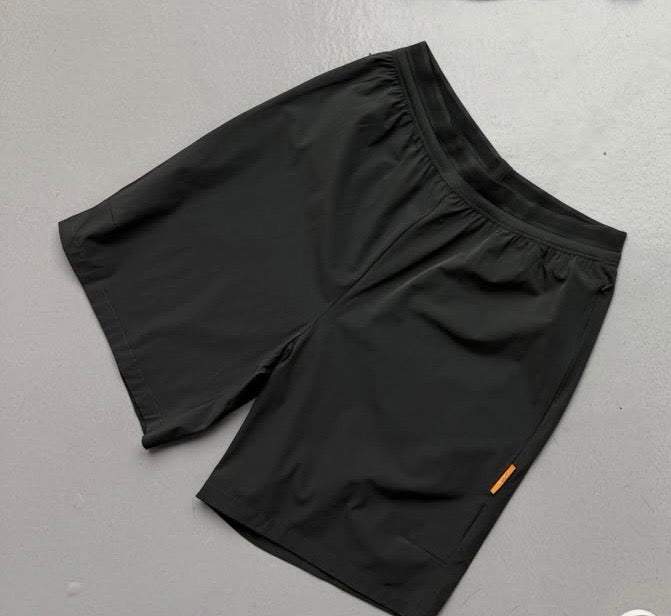 Studio By Charles charcoal grey studio shorts laid flat