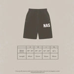 Natural Art Studio NAS appliqué black cotton shorts with elastic waistband and metal rivet pockets