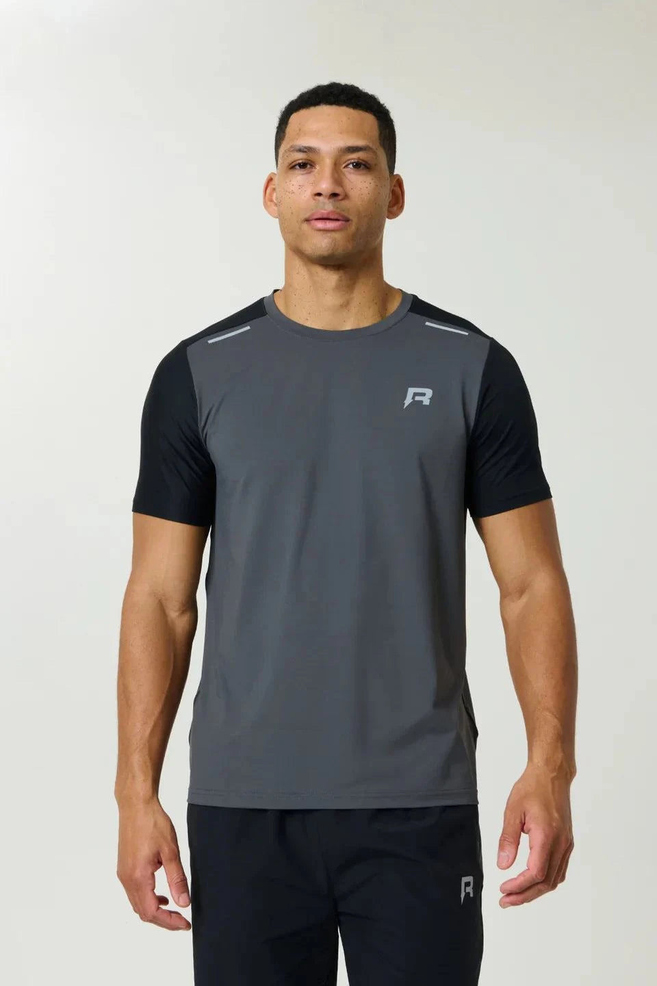 Reprimo Flight T-Shirt in slate and obsidian with lightweight, breathable fabric, athletic fit, two-color block design, and reflective strips for visibility