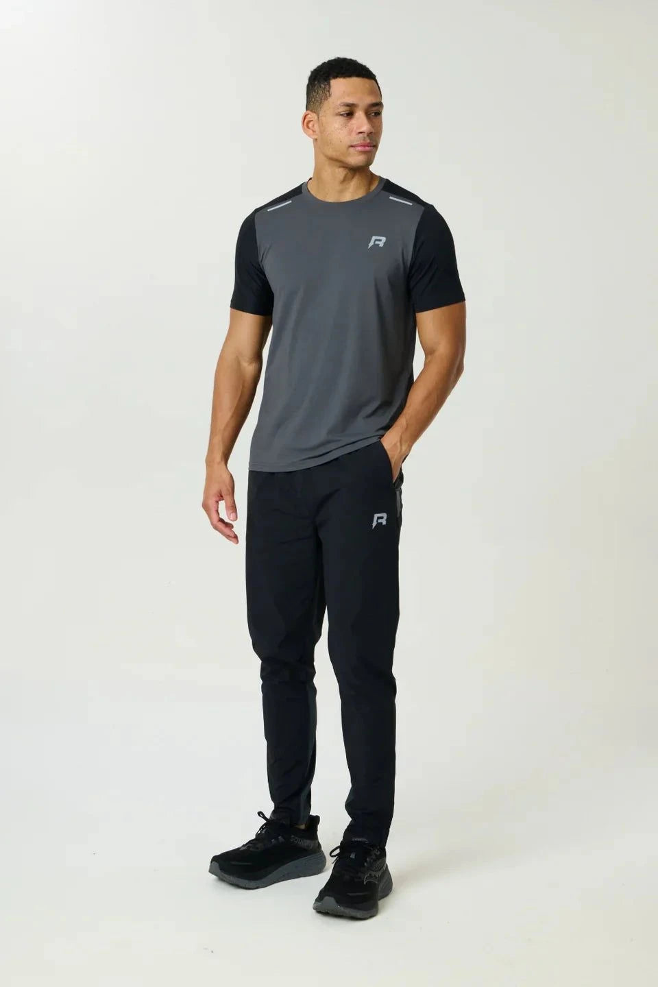 Reprimo Flight Pant slate obsidian performance workout pants with functional pockets and reflective strips