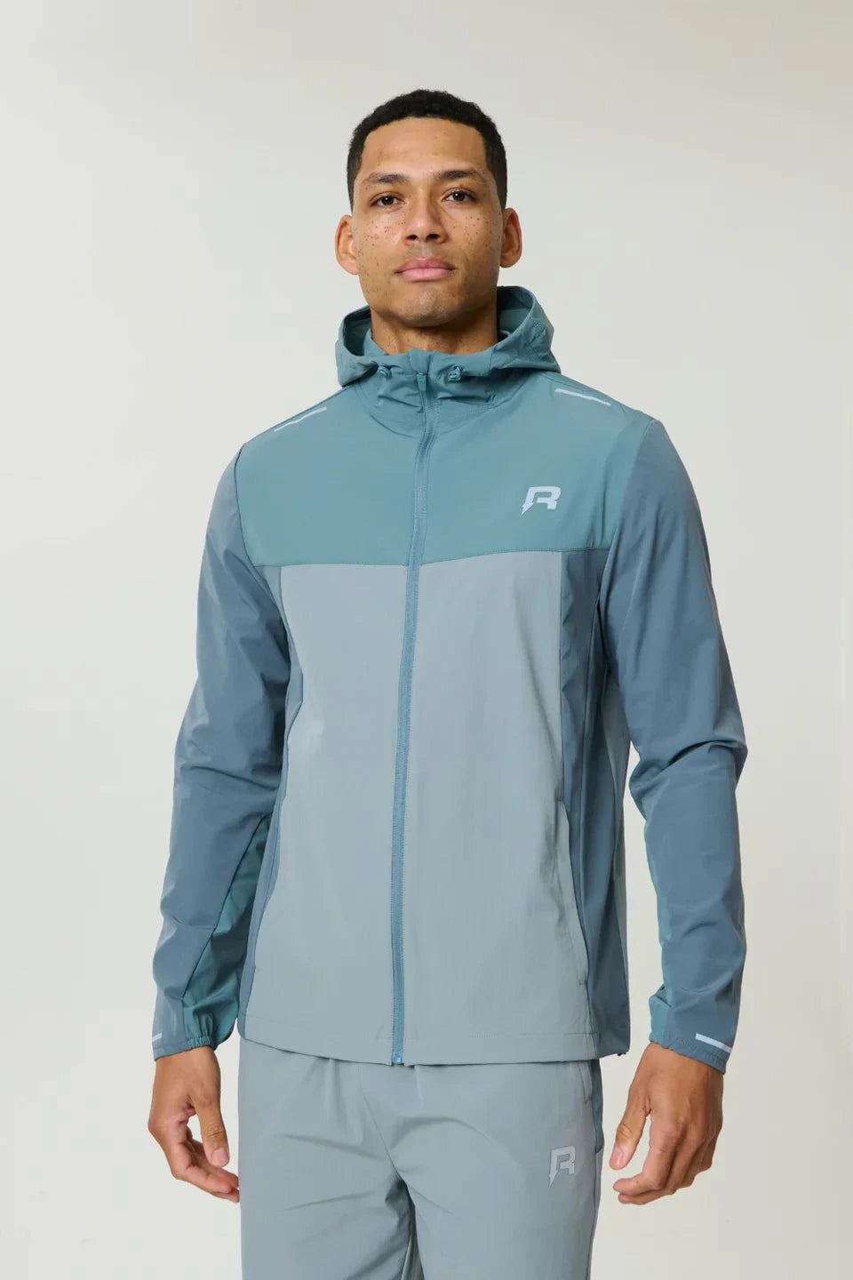 Reprimo Flight Windbreaker Tide Marble lightweight wind-resistant jacket with zip pockets and back vent for breathability