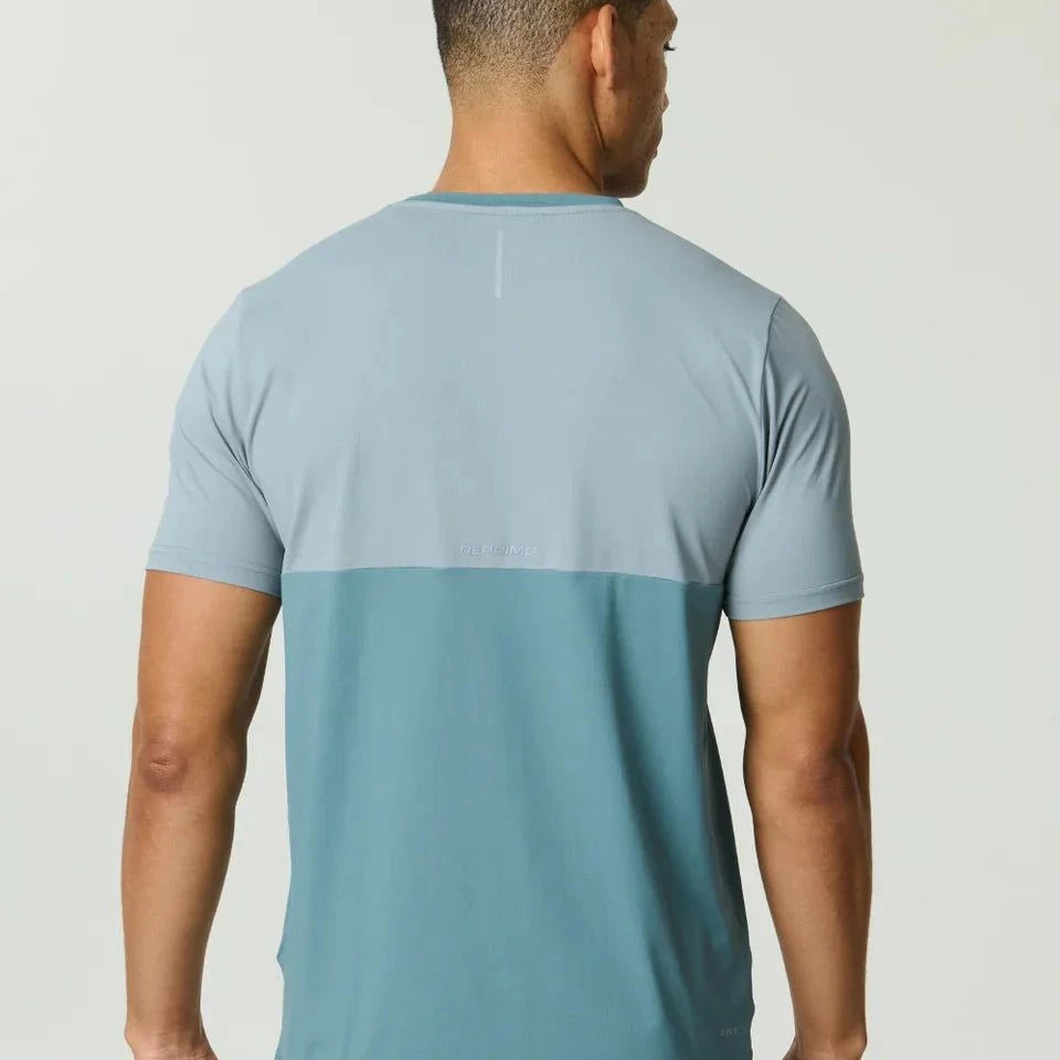 Reprimo Flight T-Shirt in Tide Marble color with lightweight, breathable fabric and reflective strips for athletic performance