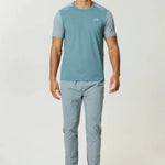 Reprimo Flight Pant Tide Marble with functional pockets and reflective strips for athletic performance and comfort