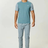 Reprimo Flight Pant Tide Marble with functional pockets and reflective strips for athletic performance and comfort