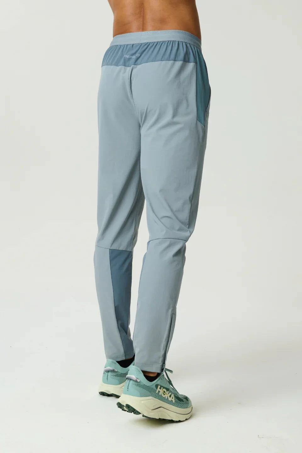 Reprimo Flight Pant Tide Marble with functional pockets and reflective strips for enhanced visibility and comfort