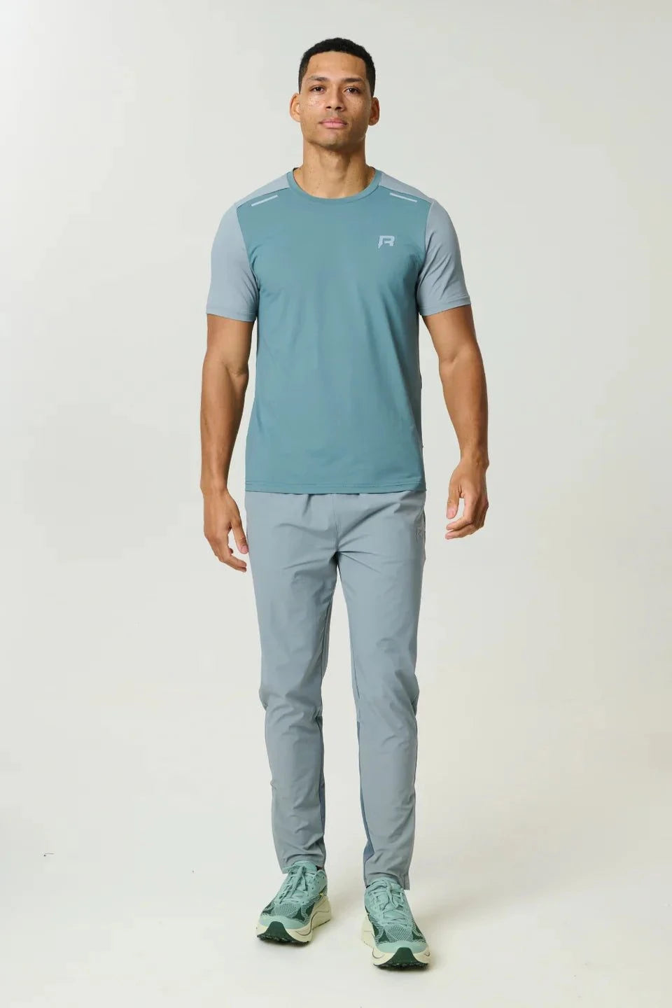Reprimo Flight T-Shirt in Tide Marble design with lightweight, breathable fabric and reflective strips for athletic performance