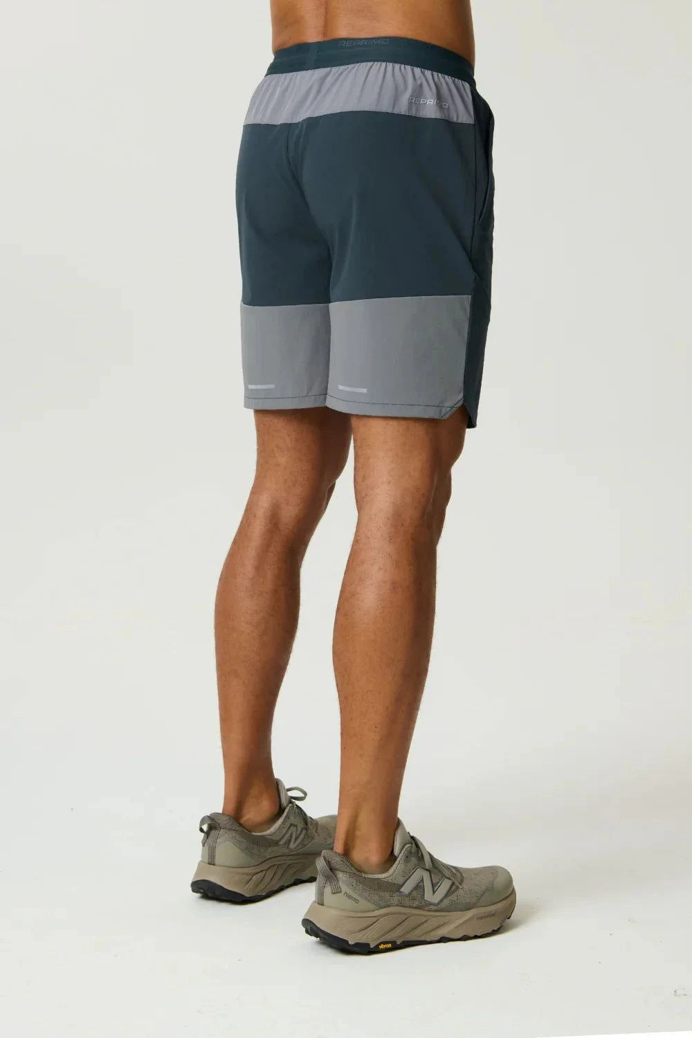 Reprimo Flight Short Gargoyle Ash Green lightweight breathable athletic shorts with functional zip pockets and elastic waistband