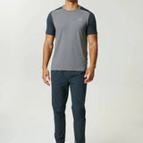 Reprimo Flight Pant in ash green with functional pockets and reflective strips for athletic performance and comfort