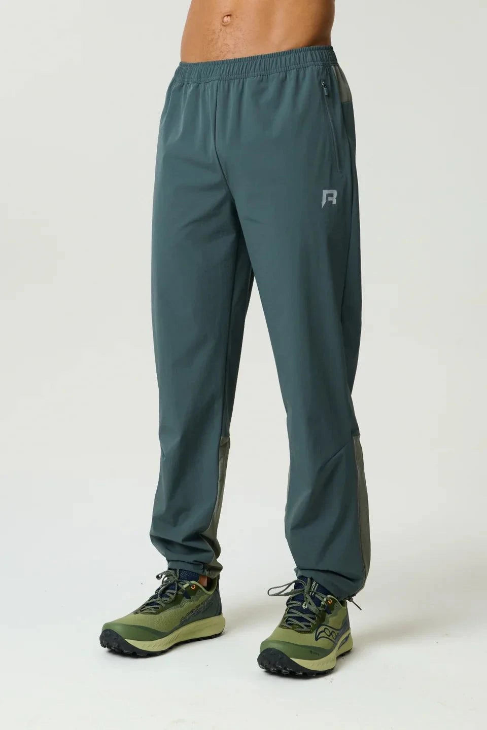Reprimo Clima Pants in dark moss and khaki with dual-fabric breathable panels and adjustable ankles for active performance