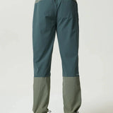 Reprimo Clima Pants in dark moss and khaki with dual-fabric design and breathable calves for active wear