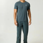 Reprimo Clima Pants in dark moss and khaki with dual-fabric design, breathable calf panels, adjustable ankles, and looser active fit for outdoor performance