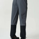 Reprimo Clima Pants in slate and obsidian with dual-fabric design, breathable calf panels, adjustable ankles, and loose fit for active performance