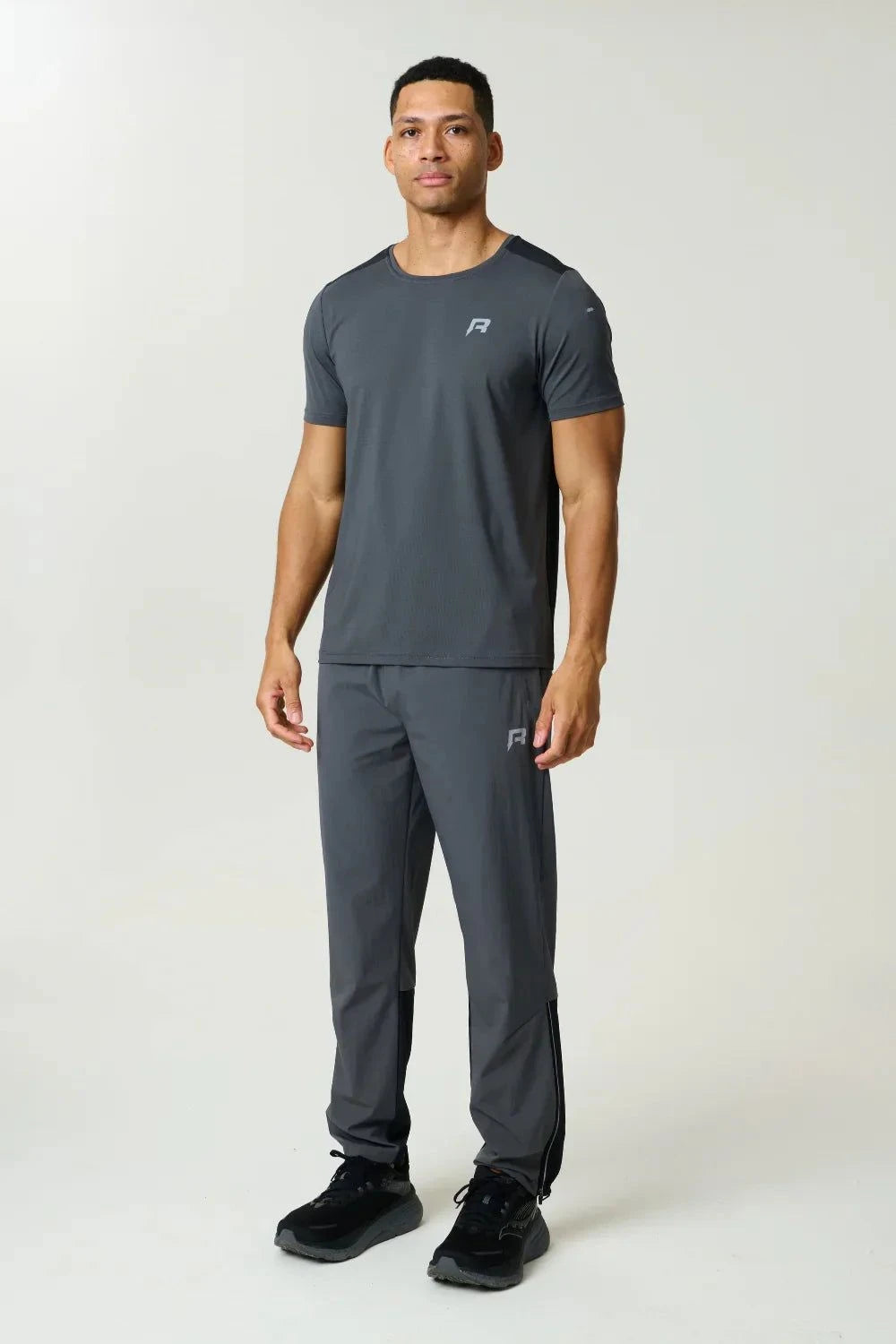 Reprimo Clima Pants in slate and obsidian with dual-fabric breathable design and adjustable ankles for active performance