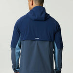 Reprimo Vortex Windbreaker in dusty blue and ink blue with ergonomic panels and reflective details