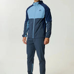 Reprimo Vortex Windbreaker in dusty blue and ink blue with ergonomic design and reflective details