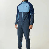 Reprimo Vortex Windbreaker in dusty blue and ink blue with ergonomic design and reflective details