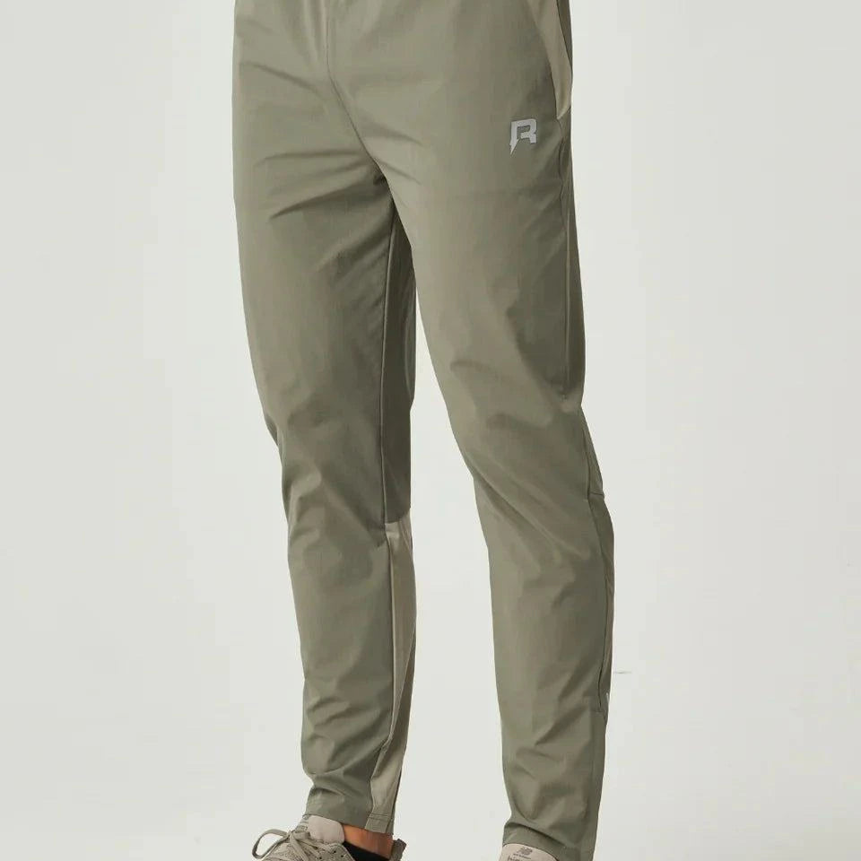 Khaki Reprimo Flight Pant with functional pockets and reflective strips for comfort and visibility