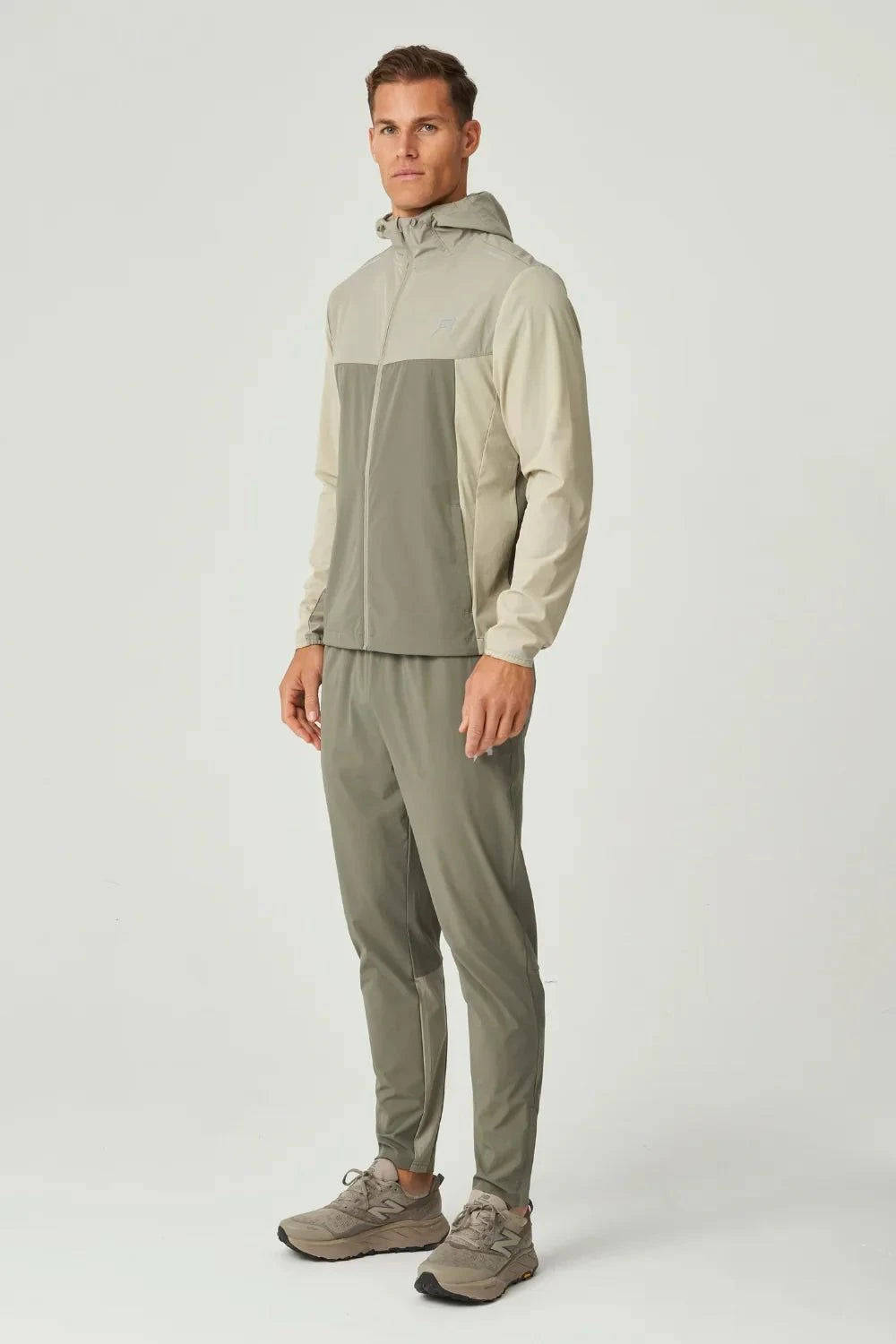Khaki Reprimo Flight Pant with functional pockets and reflective strips for enhanced visibility and comfort