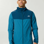 Reprimo Flight Windbreaker in lake blue and teal with zip pockets and back vent for lightweight weather protection