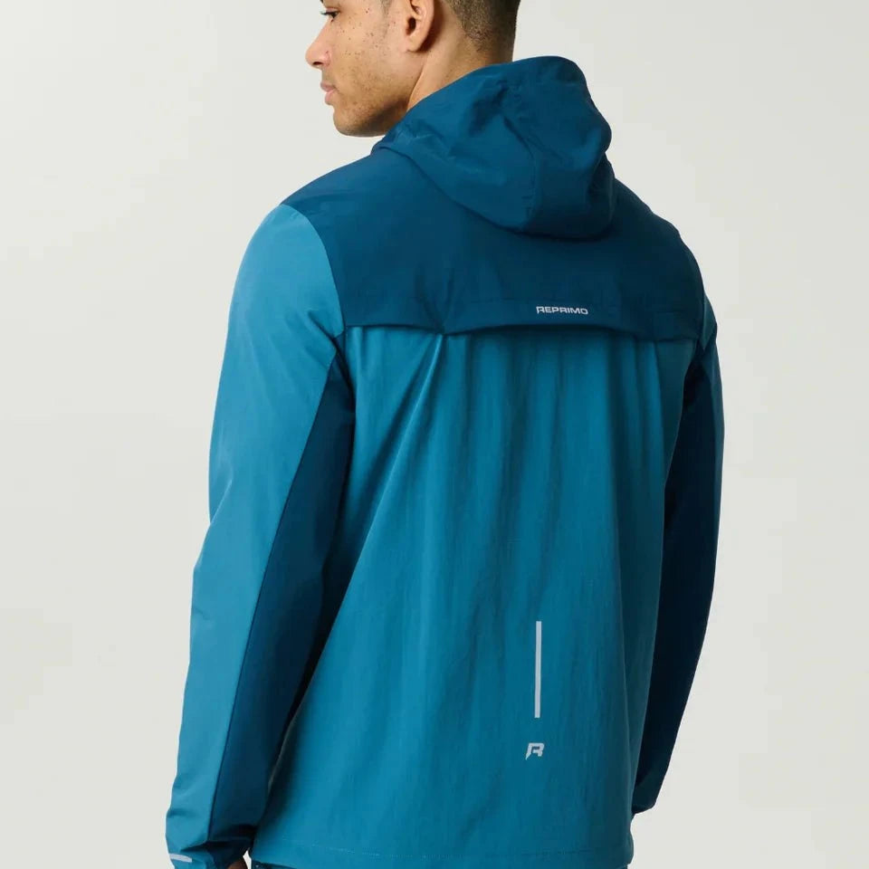 Reprimo Flight Windbreaker in lake blue and teal with zip pockets and lightweight polyamide fabric