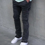 Slim fit Siarr carpenter jeans in washed black with multiple pockets and patchwork design