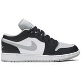 Air Jordan 1 Low GS Smoke Grey sneaker with black, white, and grey design.