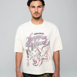 Man wearing white Suavo World Take Me 2 Heavyweight Tee with graphic print