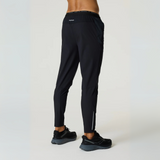 Black Reprimo Flight Pants with reflective strips and functional side pockets designed for athletic performance and comfort.