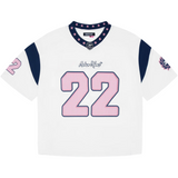 Broken Planet football jersey in white with navy sleeves and pink number 22 details