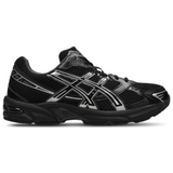 Gel 1130 black running shoe with silver accents and mesh upper