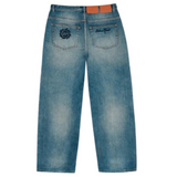 Back view of Broken Planet washed denim jeans with logo on pockets and leather patch waistband