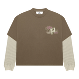 Strip Society T-Shirt featuring layered brown short sleeves and textured long sleeves with vibrant pink city skyline graphic and "Memories Are Made Faster" text on back