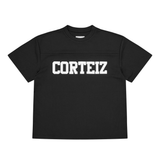 Corteiz Stash Mesh Jersey in black showing front design and texture