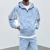 Siarr Orbit Windbreaker in powder blue with a silicone logo patch.