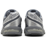 ASICS Gel 1130 sneakers in steel grey and pure silver, rear view.