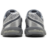 ASICS Gel 1130 sneakers in steel grey and pure silver, rear view.