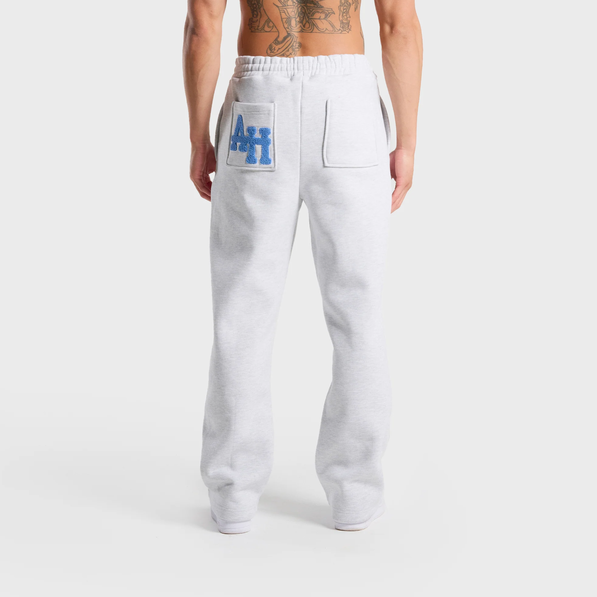 ANNIE HOOD College Joggers Grey with logo on back pocket.