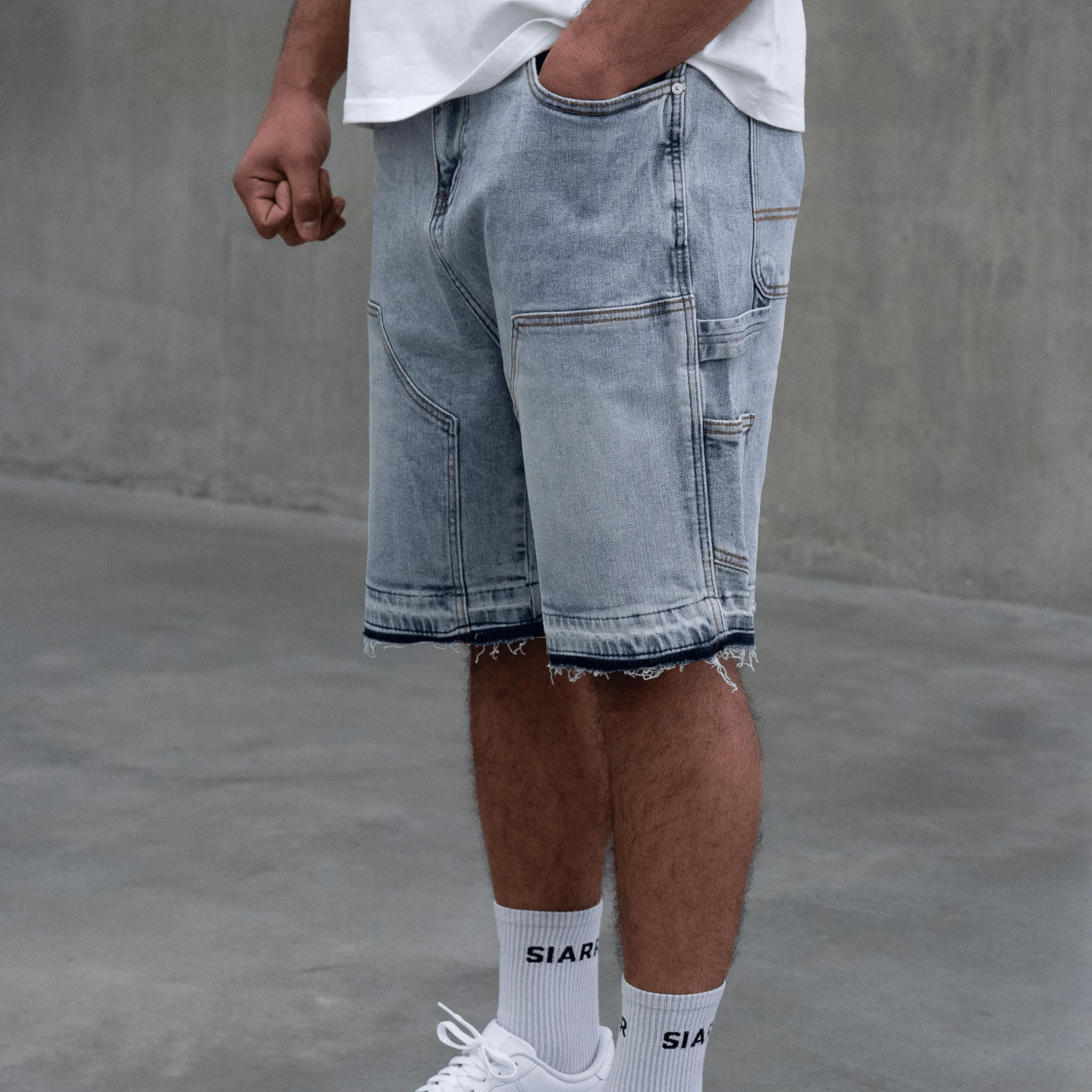 Siarr Carpenter Shorts Blue with straight fit and distressed hem
