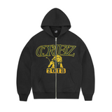 Corteiz Island Lion Varsity Zip Hoodie Black with yellow print.