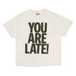 Gallery Dept. white T-shirt with bold black "YOU ARE LATE!" text print on front